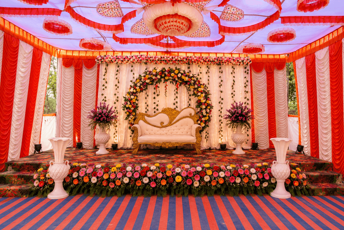 Elegant marriage reception setup with floral arrangements and ambience